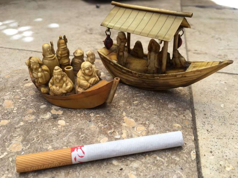 vintage japan celluloid boat pair carrying buddha and vip