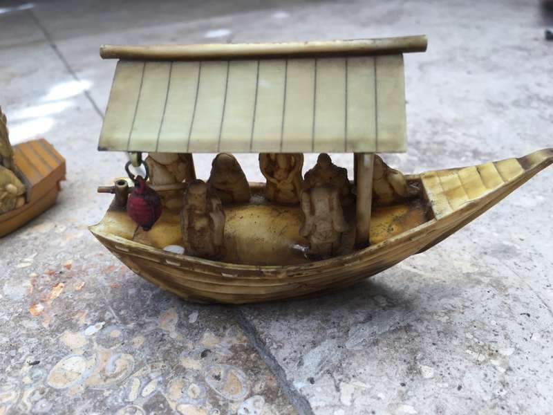 vintage japan celluloid boat pair carrying buddha and vip