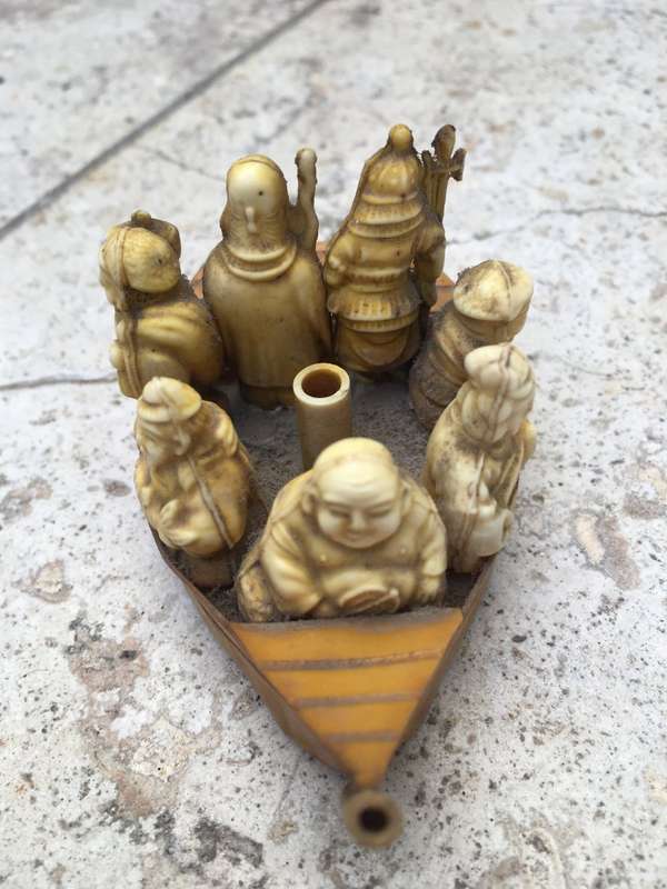 vintage japan celluloid boat pair carrying buddha and vip
