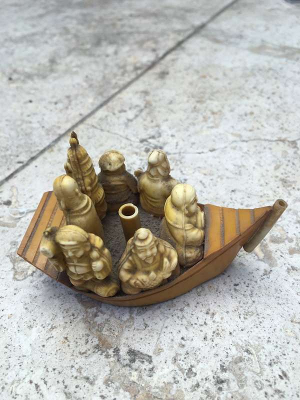 vintage japan celluloid boat pair carrying buddha and vip