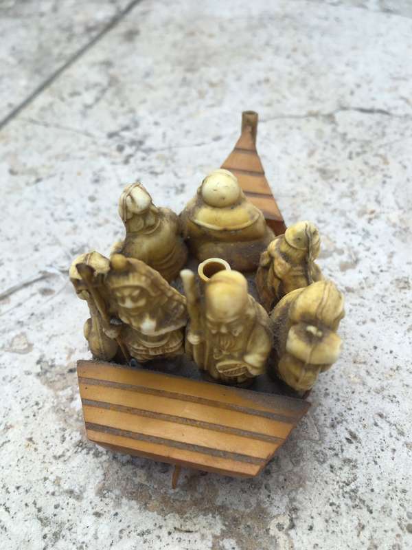 vintage japan celluloid boat pair carrying buddha and vip