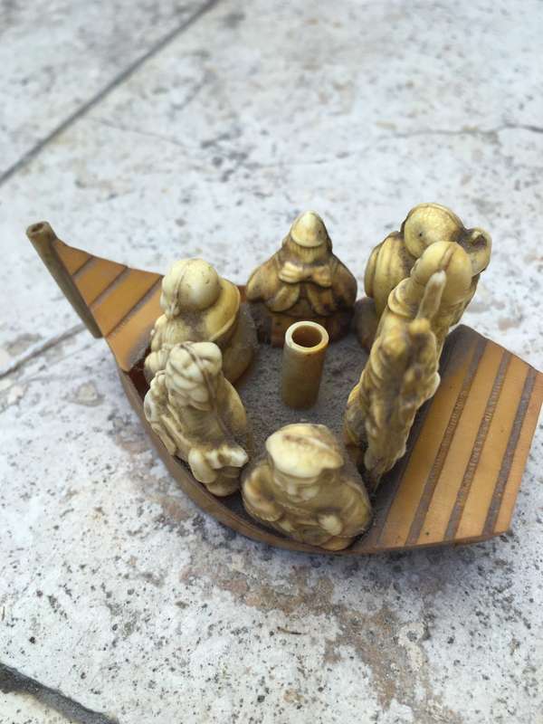 vintage japan celluloid boat pair carrying buddha and vip