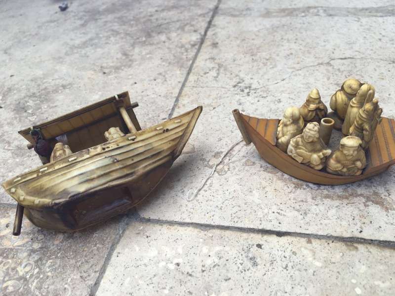 vintage japan celluloid boat pair carrying buddha and vip