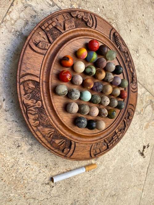 vintage handcrafted wood round strategy marble solitaire game