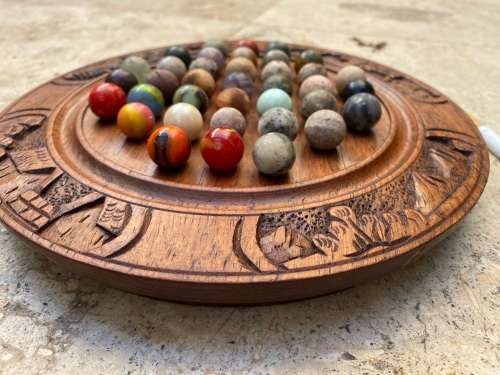 vintage handcrafted wood round strategy marble solitaire game