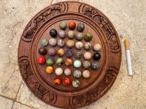 vintage handcrafted wood round strategy marble solitaire game
