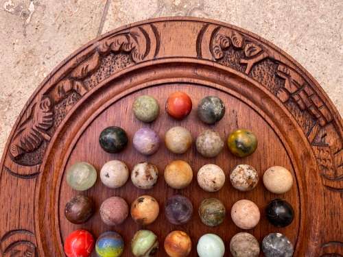 vintage handcrafted wood round strategy marble solitaire game