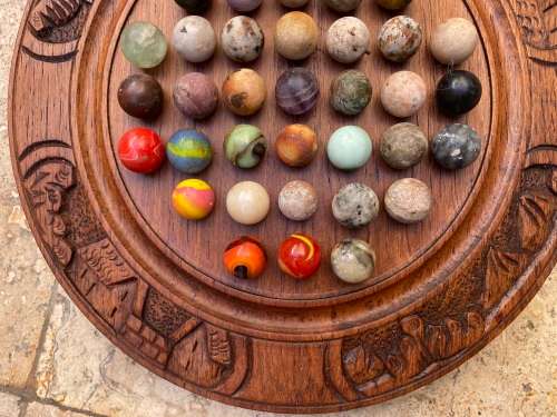 vintage handcrafted wood round strategy marble solitaire game