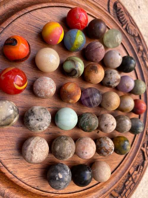 vintage handcrafted wood round strategy marble solitaire game