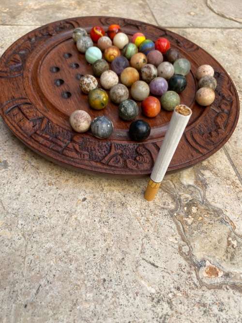 vintage handcrafted wood round strategy marble solitaire game