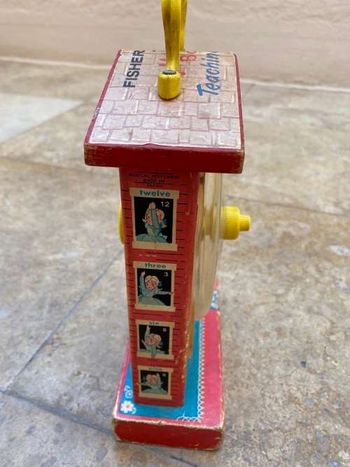 vintage fisher price music box teaching clock no 998 , made in USA