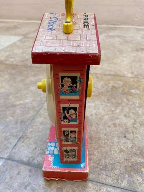 vintage fisher price music box teaching clock no 998 , made in USA