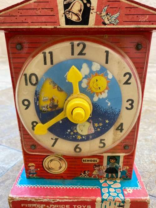 vintage fisher price music box teaching clock no 998 , made in USA