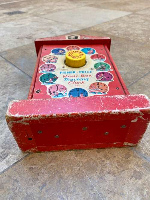 vintage fisher price music box teaching clock no 998 , made in USA