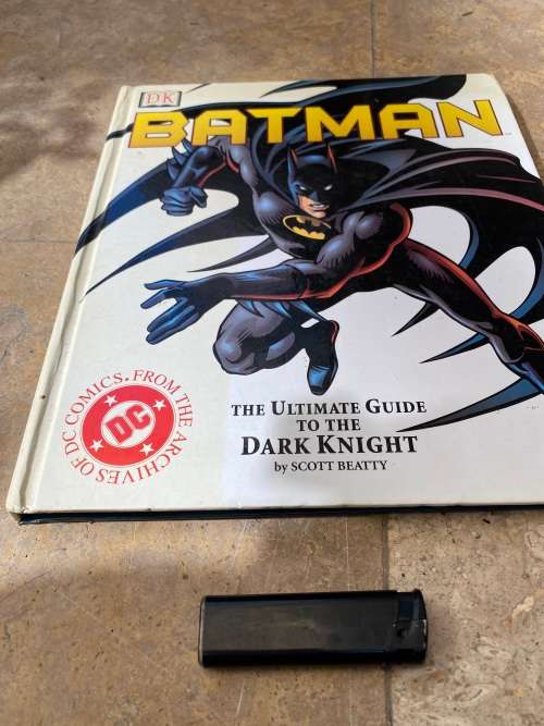 the ultimate guide to the dark knight by Scott beatty , batman archives of DC comics