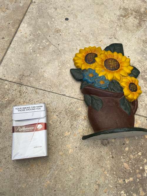 vintage cast iron door stop doorstop doorstopper sunflowers sunflower
