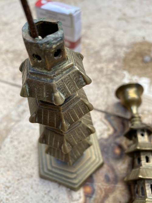 vintage brass pagoda incense holder and pagoda candle stick holder pair