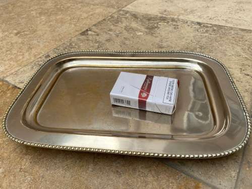 vintage silver plated footed rectangular brass tray with signs of age
