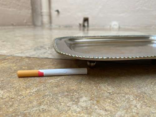 vintage silver plated footed rectangular brass tray with signs of age