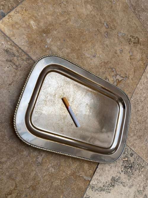 vintage silver plated footed rectangular brass tray with signs of age