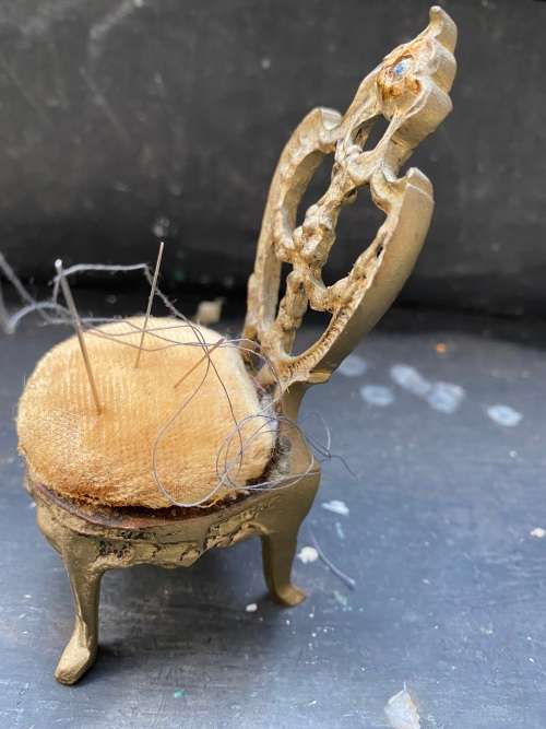 vintage brass pin needle cushion chair