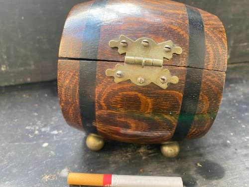 vintage brass bell gold leaf detail painting in Teofani and Co oak barrel trinket  box .