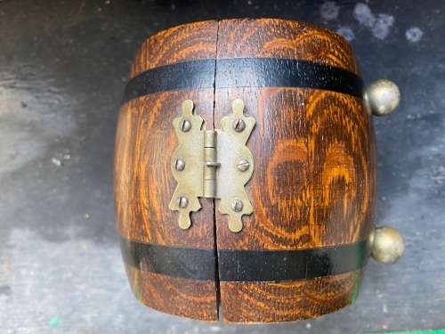 vintage brass bell gold leaf detail painting in Teofani and Co oak barrel trinket  box .