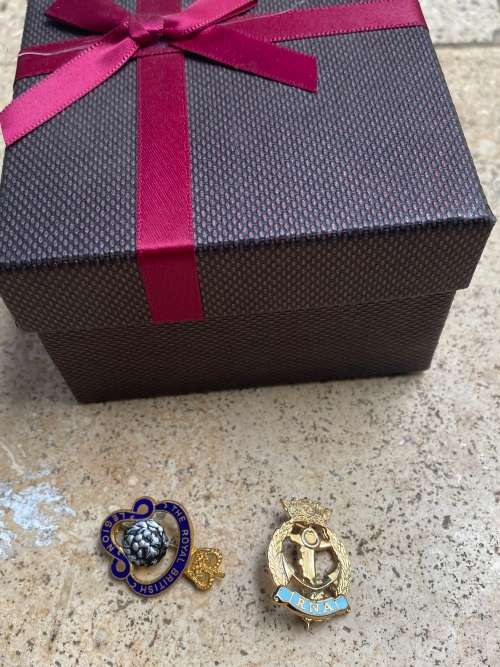 the royal british legion badge and RNA royal navy association badge pair