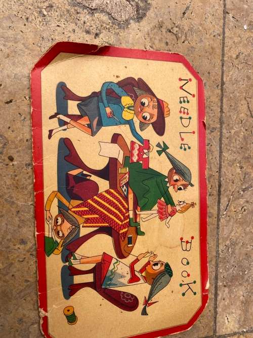vintage needle book pair , one is empty and other has contents