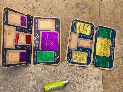 vintage needle book pair , one is empty and other has contents