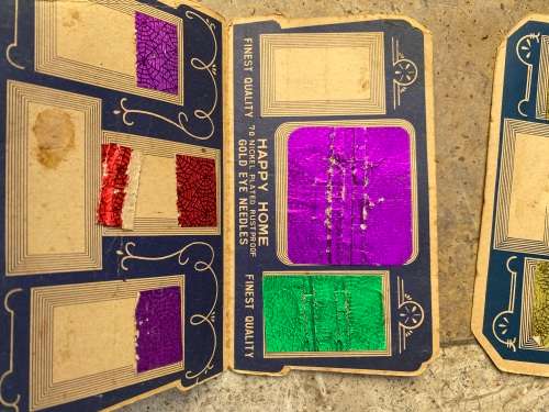 vintage needle book pair , one is empty and other has contents