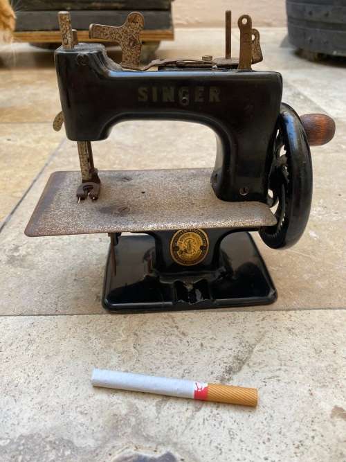 vintage mini iron with miniature singer sewing machine made in Italy TLC