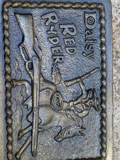 vintage Daisy red ryder belt buckle 1952