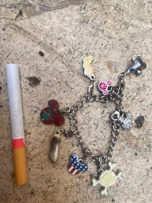 Disney Girls charm enamel bracelet with 9 removable charms