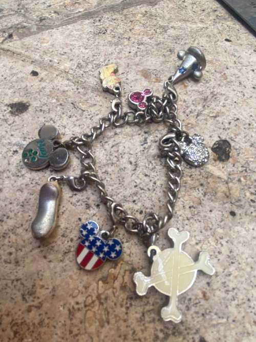 Disney Girls charm enamel bracelet with 9 removable charms