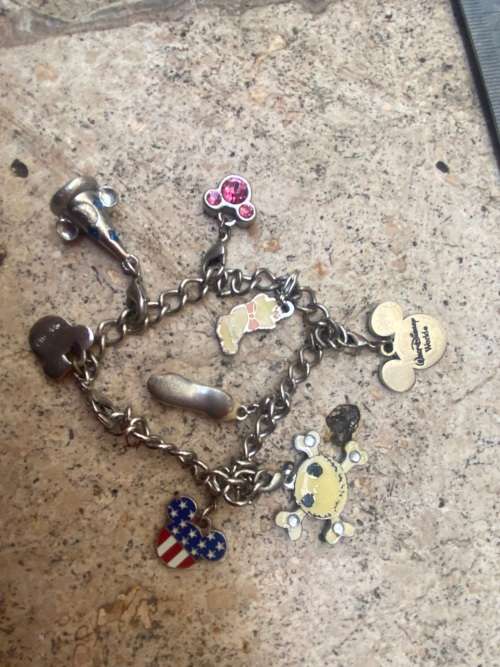 Disney Girls charm enamel bracelet with 9 removable charms
