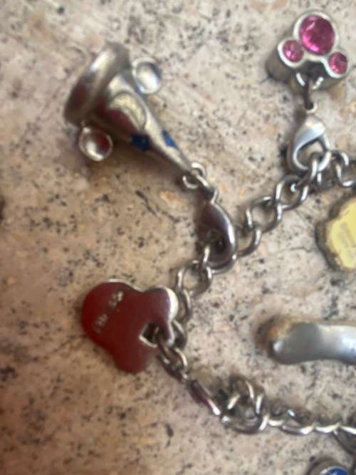 Disney Girls charm enamel bracelet with 9 removable charms