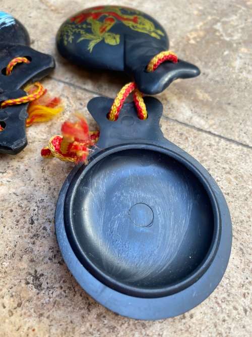 vintage black bakelite castanet castanets gold leaf cherub flamingo