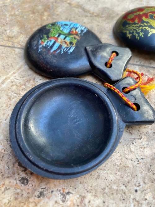 vintage black bakelite castanet castanets gold leaf cherub flamingo