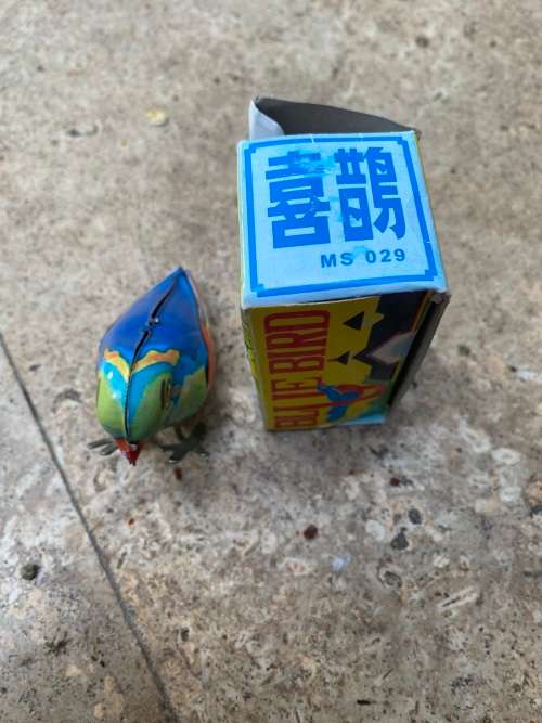 vintage blue bird wind up tin toy from 60s