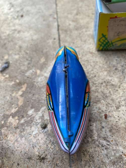 vintage blue bird wind up tin toy from 60s