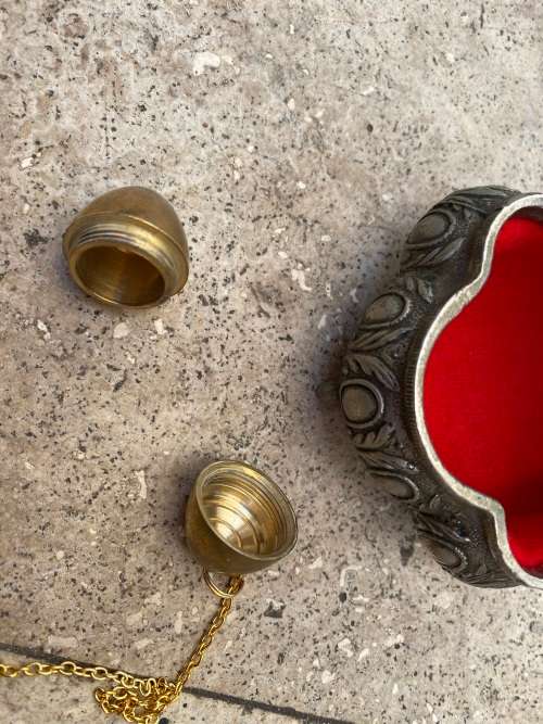 vintage footed trinket box with brass pill pendant or keychain