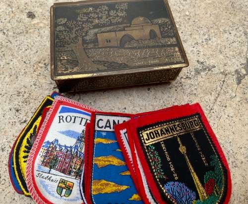 Vintage Rachels tomb brass trinket box footed with 11 travel badges
