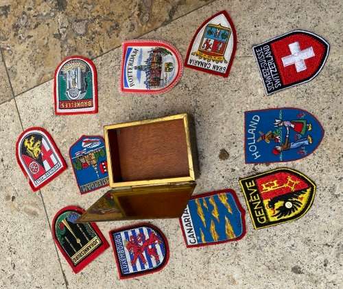 Vintage Rachels tomb brass trinket box footed with 11 travel badges