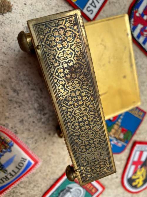 Vintage Rachels tomb brass trinket box footed with 11 travel badges