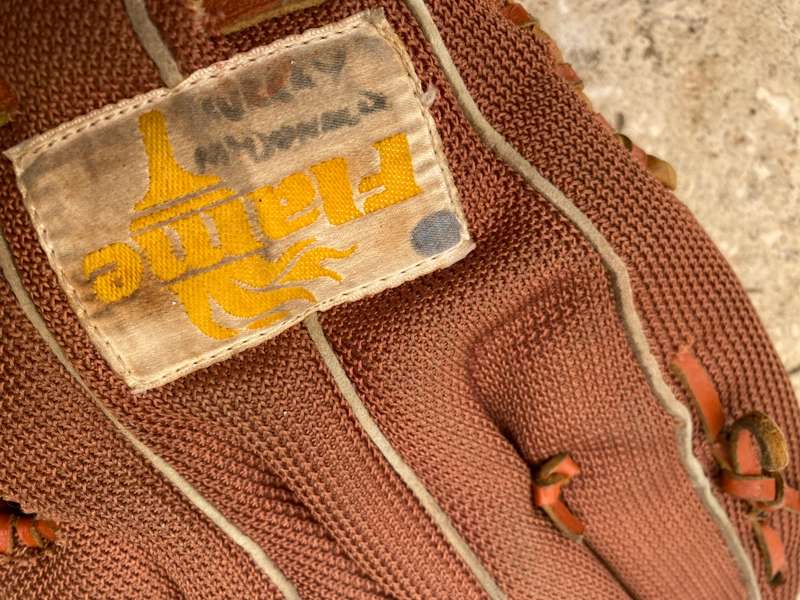 Vintage leather flame baseball  base ball mitt glove and a pair of old Wilson ball balls