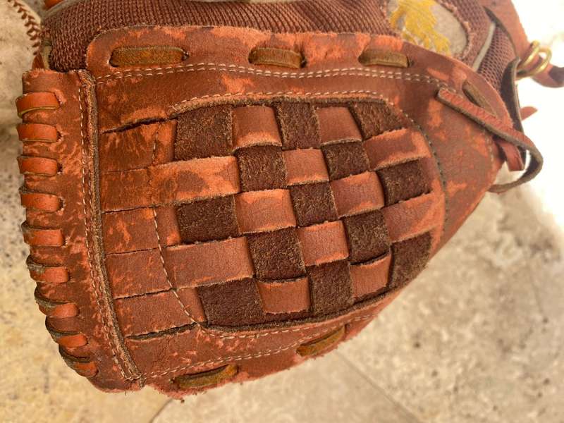 Vintage leather flame baseball  base ball mitt glove and a pair of old Wilson ball balls