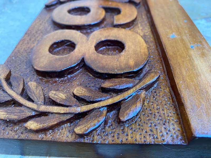 No 89 , no 68 wood carved no plaque