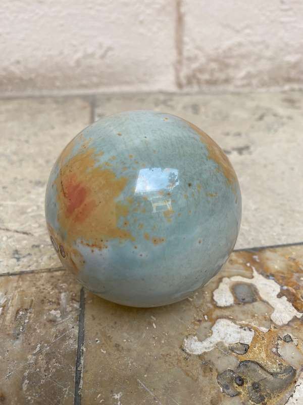 Jasper Polished precious stone sphere 8 cm diameter 24 c, circumference on carved wood base