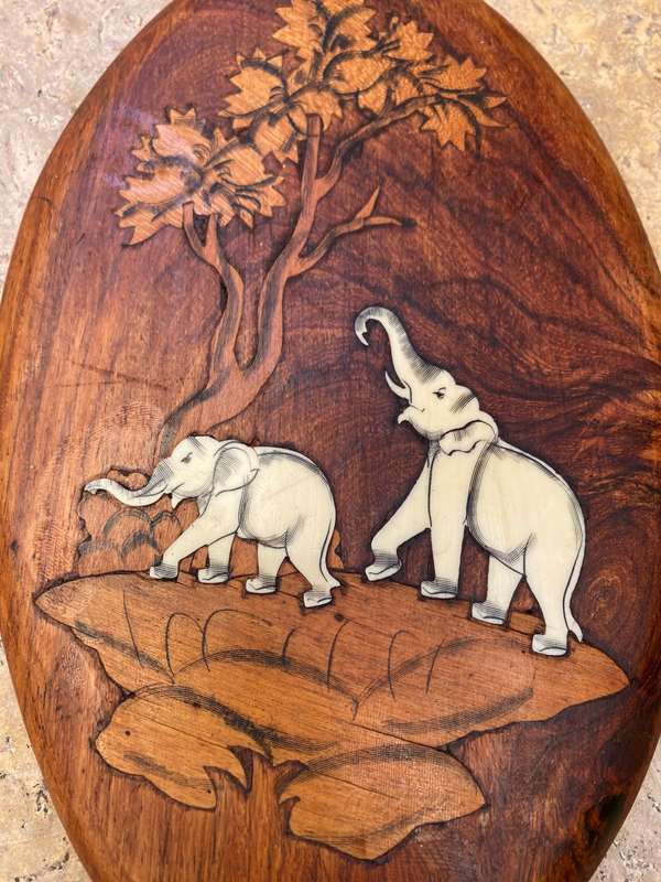 Vintage rosewood inlaid bone elephants made in India wall plaque